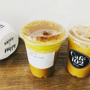 two cups of iced coffee on a table