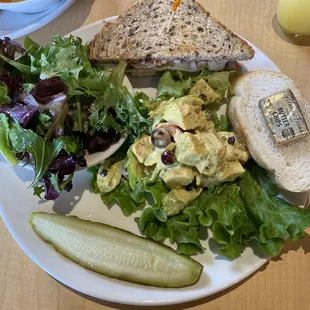 lunch combo: turkey cran sandwich, weekly special curry chicken salad that they allowed me to do with the combo, and dressed greens