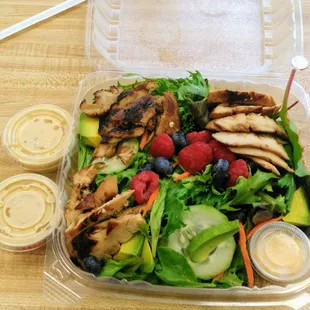 Salad with marinated grilled chicken and homemade ginger dressing - yummy!