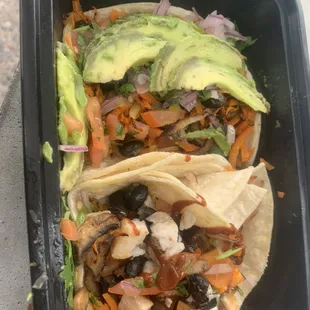 Vegan Taco on one side Chicken Taco on the other side