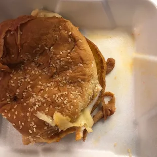 Chicken club on a greasy hamburger bun