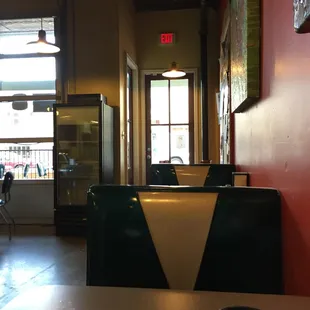 a table with a cup of coffee and a plate of food