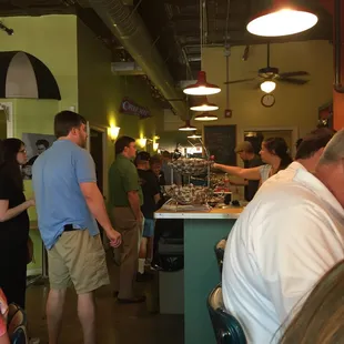 a group of people at a counter