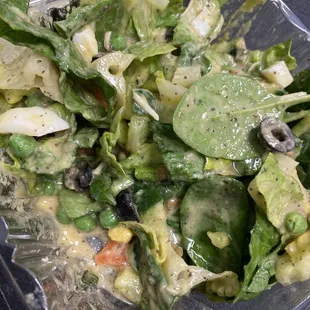 a salad in a plastic container