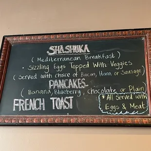 a menu on a blackboard