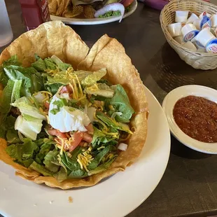 a salad in a tortilla bowl