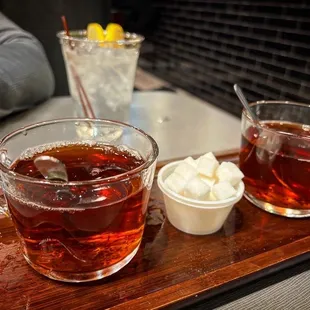 two cups of tea on a tray