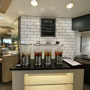 a counter with drinks on it