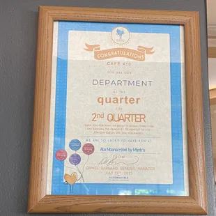 a plaque of appreciation for the department of the quarter