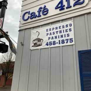 a sign on the side of a building