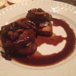 Great steak special. Tender fillets over crostini, mushrooms, and goat cheese. A little salty but good.