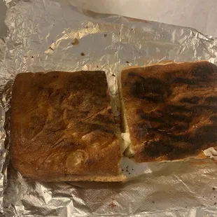 Burnt to a crisp cheese Panini. All I taste is the burnt bread.