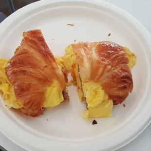 Delicious and abundant egg, cheese,  and sausage sandwich.  Yummy!