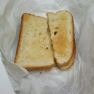 Sad.  Is it that hard to cut toast evenly? Slow service, rude owner.  Don't eat here