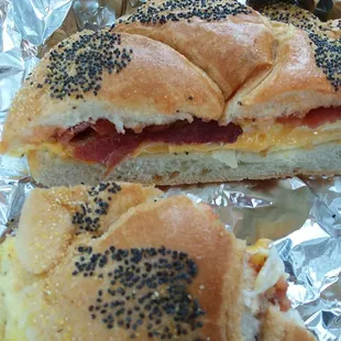 Two eggs, bacon and cheese on a roll