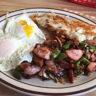Polish sausage, Mexican style. (Jalapeños added) eggs over easy, hashbrowns, cooked to perfection.