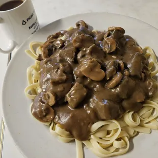 Sirloin Tips over Fettuccine w/ Mushroom Gravy