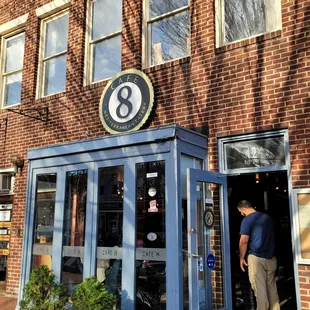 a man entering the door