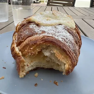 a half eaten pastry on a plate