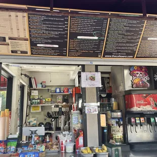 menus on the wall above the counter