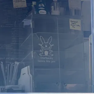 a sign in the window of a restaurant