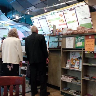 a man and a woman ordering food