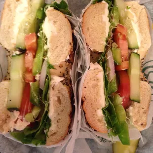 Veggie sandwich on a bagel with cream cheese