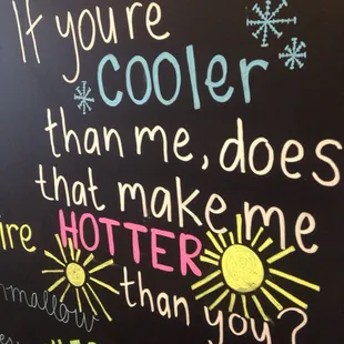 a chalk board with a quote written on it