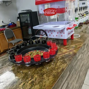 a coca cola machine on a counter