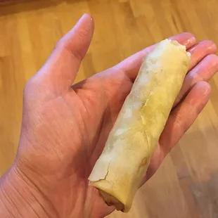 This is what you get it you order an egg roll. I have small hands; this is standard spring roll size. Tiny and thin.
