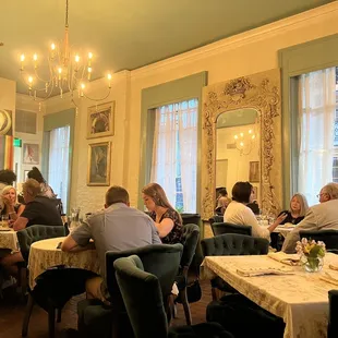 a group of people sitting at a table