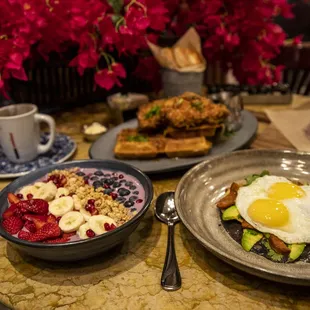 Breakfast variety: Chicken &amp; Waffles, Barbacoa Chilaquiles and Blueberry Granola Bowl.