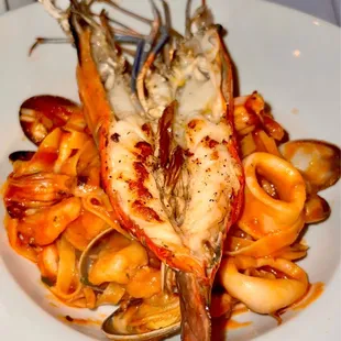 Fettuccine al Frutti di Mare... Fettuccine Pasta in a Marinara Sauce with Calmari, Manila Clams, Shrimp, Hawaiian Prawn