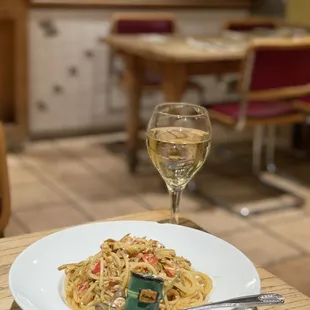 Spaghetti with crab meat and artichoke hearts.  Yum!!