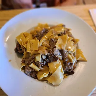 Specialita Dello Chef ( Pappardelle w/ NY Strip Steak, Caramelized Onion, White Wine, Parmesan Cheese)