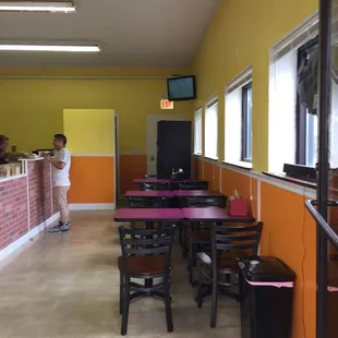 a small child standing in front of the counter