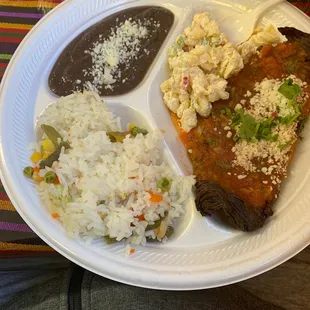 a plate of mexican food with rice and beans