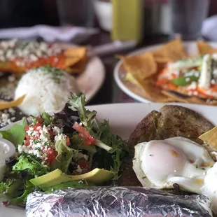 Carne Asada plate, flautas, huevos motulenos