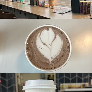 a cup of coffee with a heart drawn in it