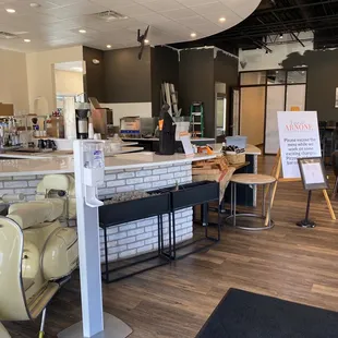 Very large coffee shop lots of seating and outdoor seating.