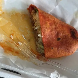 Half of a chorizo burrito. Perfect hangover cure. And for $6 you can't beat it