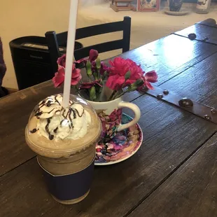 a cup of coffee on a table