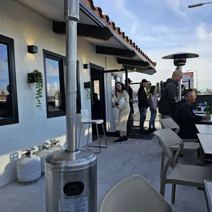 a patio with a gas heater