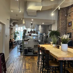 The space next to the coffee bar, with an open kitchen.