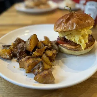 Bacon, Pimento, and Egg (on a brioche bun), &amp; Roasted Potatoes