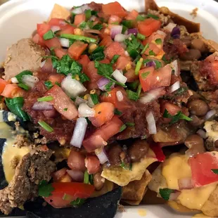 nachos in a styrofoam container