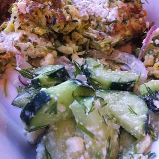 Zucchini Feta Cakes with Tzahiki Sauce and fresh cucumber salad!