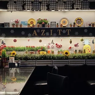 a black counter with flowers on it
