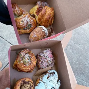 Fennel sausage croissant, ham &amp; cheese croissant, croissant cookie, and a twice baked pistachio &amp; raspberry white chili ate croissant