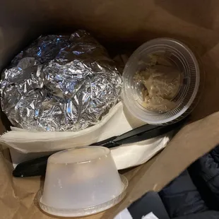 the contents of a meal in a paper bag